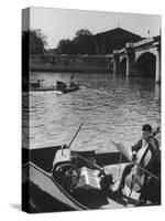 Man Playing Cello on Boat-Loomis Dean-Stretched Canvas