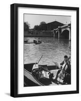 Man Playing Cello on Boat-Loomis Dean-Framed Photographic Print