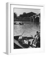 Man Playing Cello on Boat-Loomis Dean-Framed Photographic Print