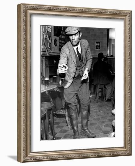 Man Playing Quoits, Like Horse Shoes, in an English Pub-Hans Wild-Framed Photographic Print