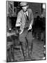 Man Playing Quoits, Like Horse Shoes, in an English Pub-Hans Wild-Mounted Photographic Print