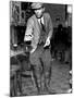Man Playing Quoits, Like Horse Shoes, in an English Pub-Hans Wild-Mounted Photographic Print