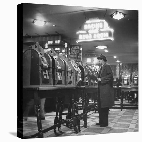 Man Playing the Slot Machines-Ralph Morse-Stretched Canvas