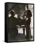 Man Plays a Piano and Looks up at a Glamorous Woman in a Long Dress-null-Framed Stretched Canvas