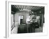 Man Preparing Tea Inside His Camping Trailer-null-Framed Photo