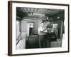 Man Preparing Tea Inside His Camping Trailer-null-Framed Photo