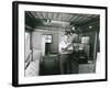 Man Preparing Tea Inside His Camping Trailer-null-Framed Photo