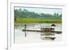 Man Punting Bamboo Raft on Situ Cangkuang Lake at This Village known for its Temple-Rob-Framed Photographic Print