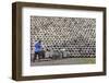 Man pushing cart loaded with wine jars to the big pile in a winery, Zhejiang Province, China-Keren Su-Framed Photographic Print