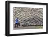 Man pushing cart loaded with wine jars to the big pile in a winery, Zhejiang Province, China-Keren Su-Framed Photographic Print