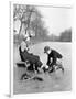 Man Putting on Woman's Ice Skates-Philip Gendreau-Framed Photographic Print