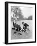 Man Putting on Woman's Ice Skates-Philip Gendreau-Framed Photographic Print