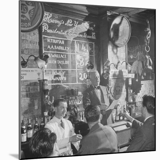 Man Reading About Election Straw Votes at Harry's New York Bar-Yale Joel-Mounted Photographic Print