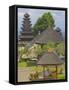 Man Reading at Besakih Temple, Bali, Indonesia, Southeast Asia, Asia-Sakis Papadopoulos-Framed Stretched Canvas