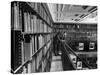 Man Reading Book Among Shelves on Balcony in New York Public Library-Alfred Eisenstaedt-Stretched Canvas