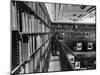 Man Reading Book Among Shelves on Balcony in New York Public Library-Alfred Eisenstaedt-Mounted Photographic Print