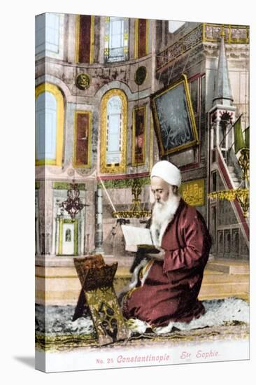 Man Reading Koran in Hagia Sofia-null-Stretched Canvas