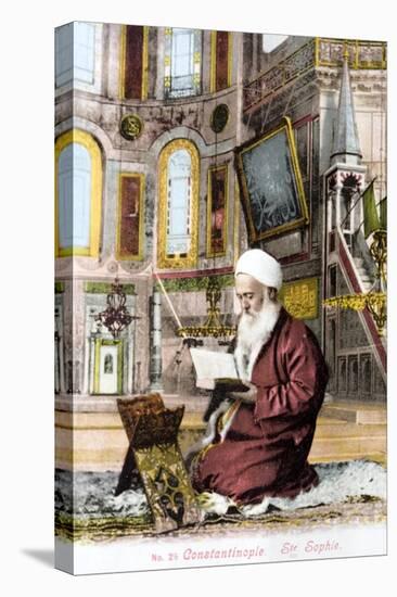 Man Reading Koran in Hagia Sofia-null-Stretched Canvas