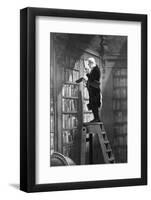 Man Reading on Ladder in Library-null-Framed Photographic Print