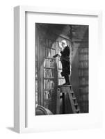 Man Reading on Ladder in Library-null-Framed Photographic Print
