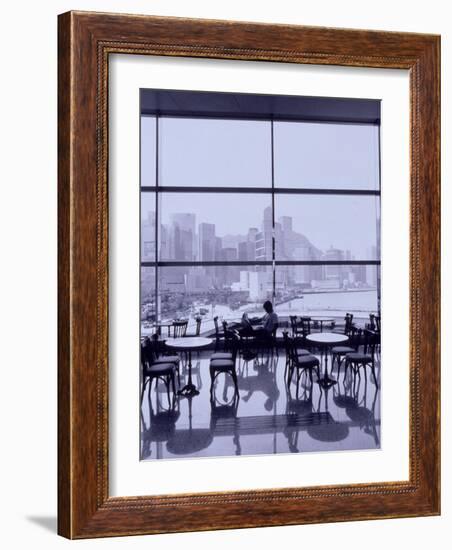 Man Reading Paper, Hong Kong, China-Walter Bibikow-Framed Photographic Print