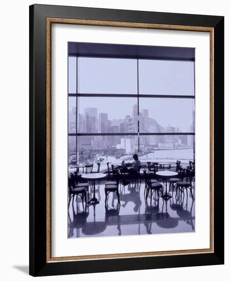 Man Reading Paper, Hong Kong, China-Walter Bibikow-Framed Photographic Print