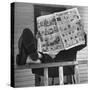Man Reading the Comics Section of the Detroit Times on a Typical Sunday During WWII-Walter Sanders-Stretched Canvas