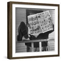 Man Reading the Comics Section of the Detroit Times on a Typical Sunday During WWII-Walter Sanders-Framed Photographic Print