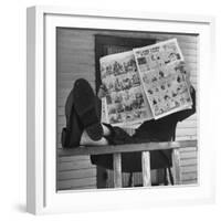 Man Reading the Comics Section of the Detroit Times on a Typical Sunday During WWII-Walter Sanders-Framed Photographic Print