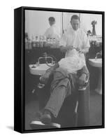 Man Receiving a Shave in a Barber Shop-Cornell Capa-Framed Stretched Canvas