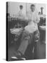 Man Receiving a Shave in a Barber Shop-Cornell Capa-Stretched Canvas