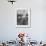 Man Receiving a Shave in a Barber Shop-Cornell Capa-Framed Photographic Print displayed on a wall