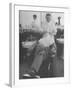 Man Receiving a Shave in a Barber Shop-Cornell Capa-Framed Photographic Print