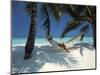 Man Relaxing on a Beachside Hammock, Maldives, Indian Ocean-Papadopoulos Sakis-Mounted Photographic Print