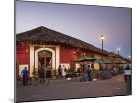 Man Rideing Bike Past Restaurant on Calle La Calzada, Granada, Nicaragua, Central America-Jane Sweeney-Mounted Photographic Print