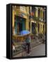 Man Riding a Bike and Holding Umbrella, Hoi An, Indochina-Eitan Simanor-Framed Stretched Canvas