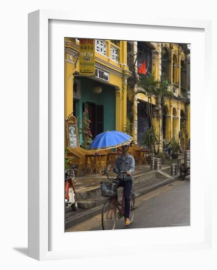 Man Riding a Bike and Holding Umbrella, Hoi An, Indochina-Eitan Simanor-Framed Photographic Print