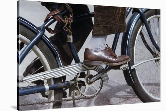 Man Riding Bicycle in Dress Shoes-William P. Gottlieb-Stretched Canvas