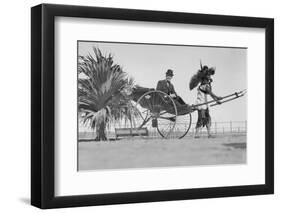 Man Riding in Rickshaw-null-Framed Photographic Print
