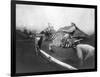 Man Riding Zebra Jumping Fence Photograph - Africa-Lantern Press-Framed Art Print