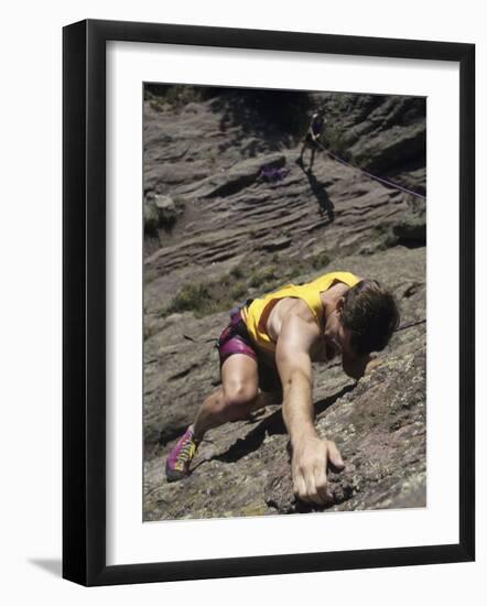 Man Rock Climbing While Tethered to Another Climber Below-null-Framed Photographic Print