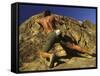 Man Rock Climbing Without Equipment-null-Framed Stretched Canvas