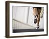 Man Running across a Bridge, United Arab Emirates-Julian Love-Framed Photographic Print