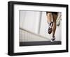 Man Running across a Bridge, United Arab Emirates-Julian Love-Framed Photographic Print