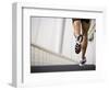 Man Running across a Bridge, United Arab Emirates-Julian Love-Framed Photographic Print