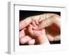 Man's Hand Holding Baby's Hand-Mitch Diamond-Framed Photographic Print