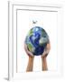 Man's Hands Holding the Planet Earth, with a Jet Aircraft Flying Above-null-Framed Art Print