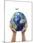 Man's Hands Holding the Planet Earth, with a Jet Aircraft Flying Above-null-Mounted Art Print