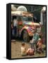 Man Seated with Two Young Boys in Front of a Wildly Painted School Bus, Woodstock Music Art Fest-John Dominis-Framed Stretched Canvas