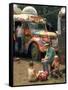 Man Seated with Two Young Boys in Front of a Wildly Painted School Bus, Woodstock Music Art Fest-John Dominis-Framed Stretched Canvas